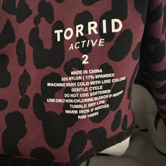 Torrid Leggings with Purple and Yellow Leopard Print - Picture 3 of 4